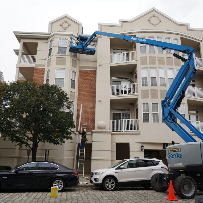 Garden State Gutter Cleaning Commercial Gutter Installation with aerial lift NJ New Jersey